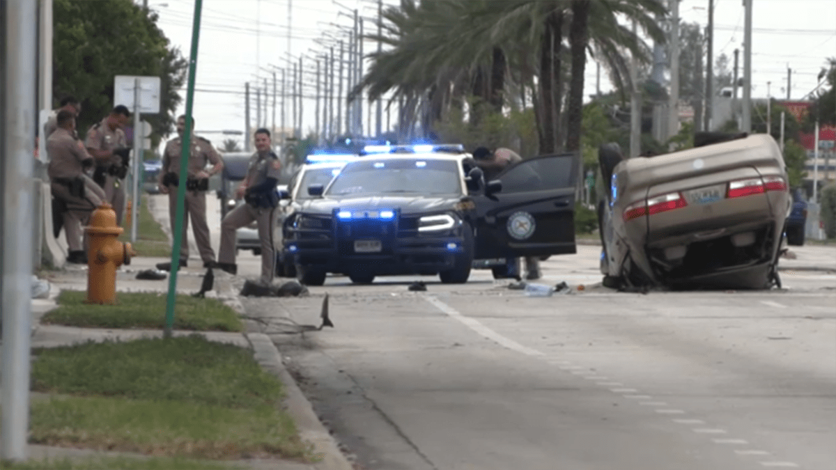 Pair caught after stolen car chase in Miami-Dade ends in rollover crash, FHP says